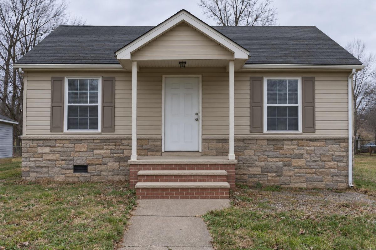 Plain entry with broken steps, after masonry work